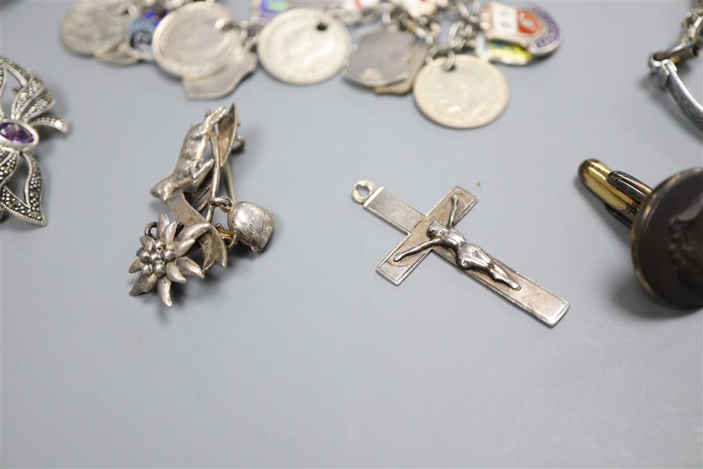 A white metal charm bracelet hung with enamel medallions, one other charm bracelet, marcasite watch and pendant etc.